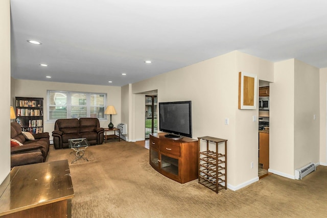 14 Florence Unit 25D, Freeport, NY 11520 - living room featuring carpet, a baseboard radiator, recessed lighting, and baseboards