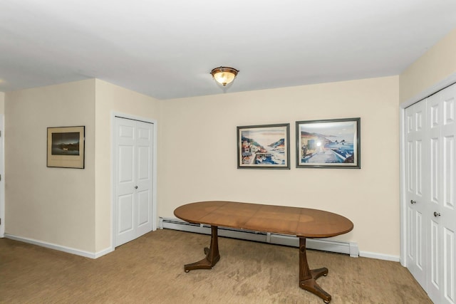 14 Florence Unit 25D, Freeport, NY 11520 - dining area with light carpet, baseboard heating, and baseboards
