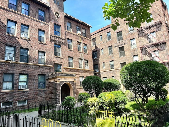 62-64 Saunders St Unit 3H, Rego Park, NY 11374 - view of apartment building / complex featuring cooling unit