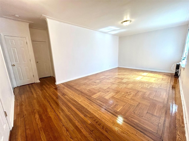 62-64 Saunders St Unit 3H, Rego Park, NY 11374 - empty room featuring baseboards and a smoke detector