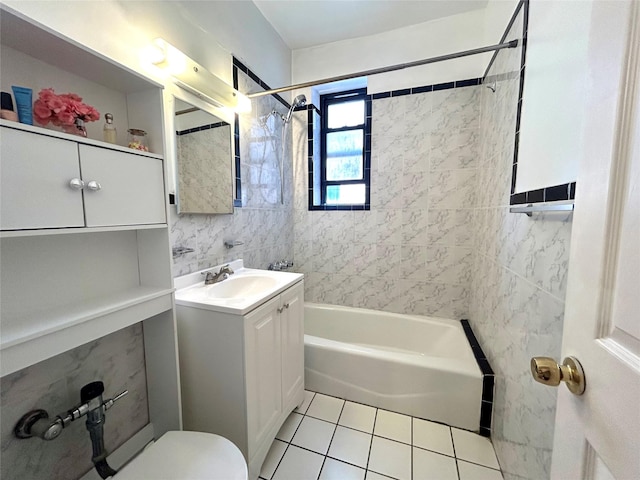 62-64 Saunders St Unit 3H, Rego Park, NY 11374 - bathroom featuring shower / bathtub combination, tile patterned floors, toilet, vanity, and tile walls