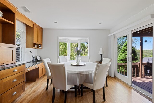 3 Summit Dr, Baiting Hollow, NY 11933 - dining room featuring plenty of natural light and light wood finished floors