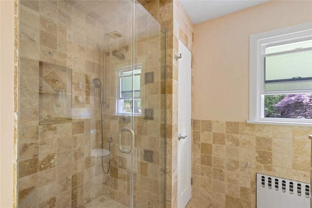 3 Summit Dr, Baiting Hollow, NY 11933 - full bath with radiator, a shower stall, and tile walls