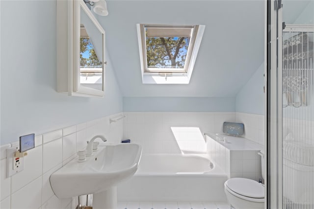 3 Summit Dr, Baiting Hollow, NY 11933 - bathroom featuring toilet, a skylight, a bath, tile walls, and a shower with shower door