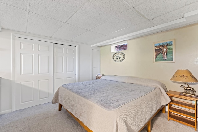 3 Summit Dr, Baiting Hollow, NY 11933 - bedroom featuring carpet floors, a paneled ceiling, and a closet