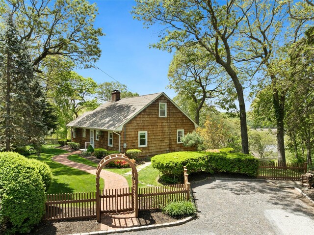 3 Summit Dr, Baiting Hollow, NY 11933 - view of front of home featuring a chimney