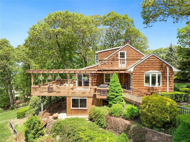 3 Summit Dr, Baiting Hollow, NY 11933 - rear view of property with a chimney and a deck