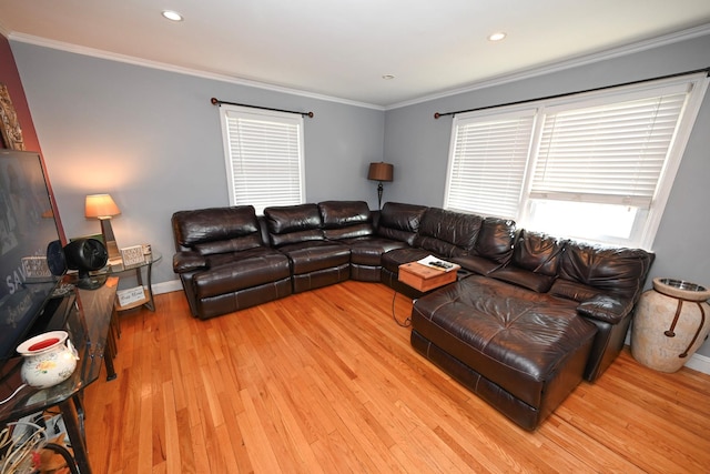 living area with plenty of natural light, wood finished floors, ornamental molding, baseboards, and recessed lighting