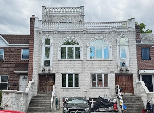 20-42 26th St, Astoria, NY 11105 - view of front of home with entry steps and brick siding