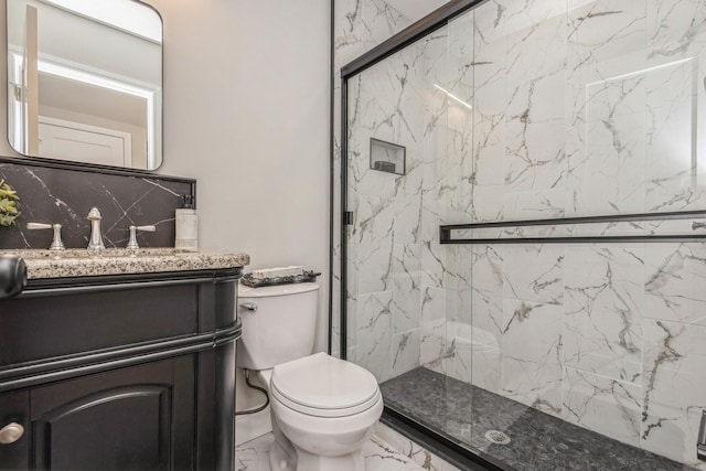 full bathroom with marble finish flooring, a marble finish shower, toilet, and vanity