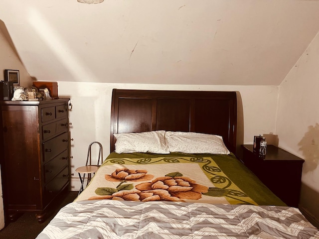 112 E Seaman Ave E, Freeport, NY 11520 - bedroom featuring vaulted ceiling and dark colored carpet
