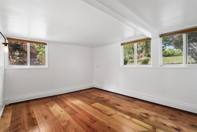 14 Lounsbury Rd, Croton-On-Hudson, NY 10520 - unfurnished room with plenty of natural light, hardwood / wood-style floors, baseboard heating, and baseboards