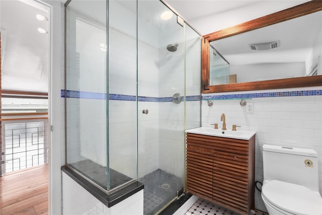 14 Lounsbury Rd, Croton-On-Hudson, NY 10520 - full bathroom with vanity, a stall shower, toilet, and tile walls