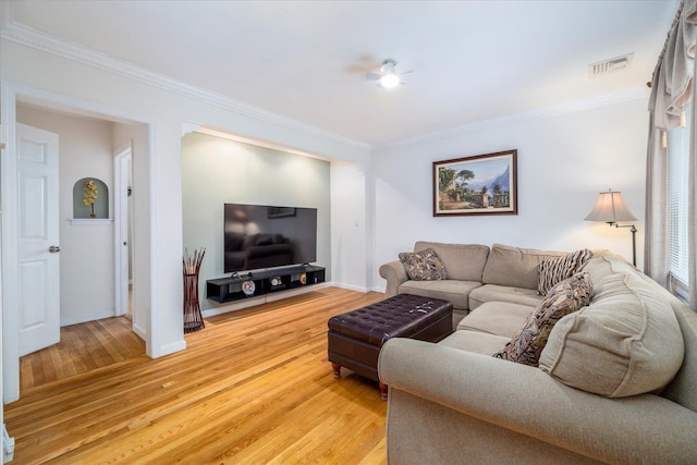 19 Croyden St, New Hyde Park, NY 11040 - living room with light wood-type flooring, crown molding, and baseboards