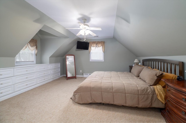 19 Croyden St, New Hyde Park, NY 11040 - bedroom featuring carpet floors, baseboard heating, vaulted ceiling, and ceiling fan