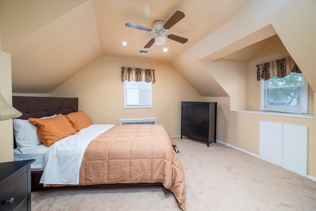 19 Croyden St, New Hyde Park, NY 11040 - bedroom with lofted ceiling, carpet, radiator, and a ceiling fan