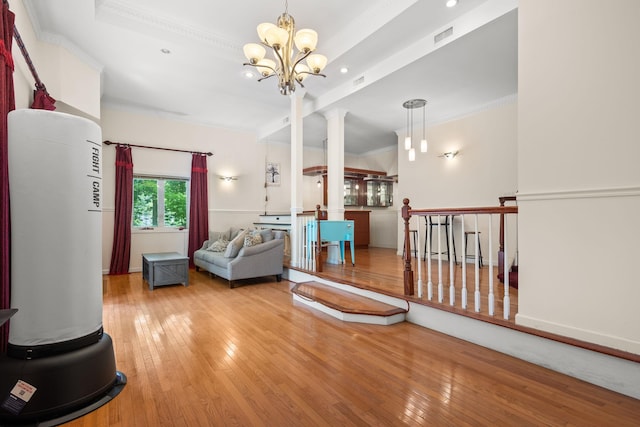 11C Piping Rock Dr, Ossining, NY 10562 - living room featuring ornate columns, hardwood / wood-style flooring, ornamental molding, a chandelier, and recessed lighting