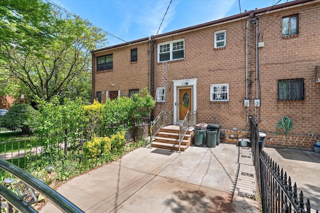 multi unit property featuring brick siding