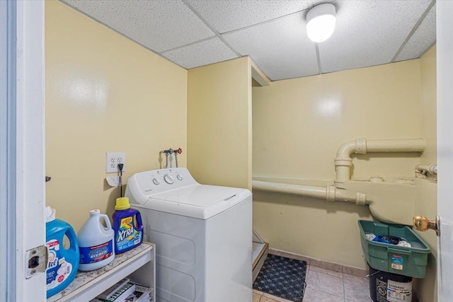 477 Berriman St, Brooklyn, NY 11208 - laundry room with washer / dryer, tile patterned flooring, and baseboards