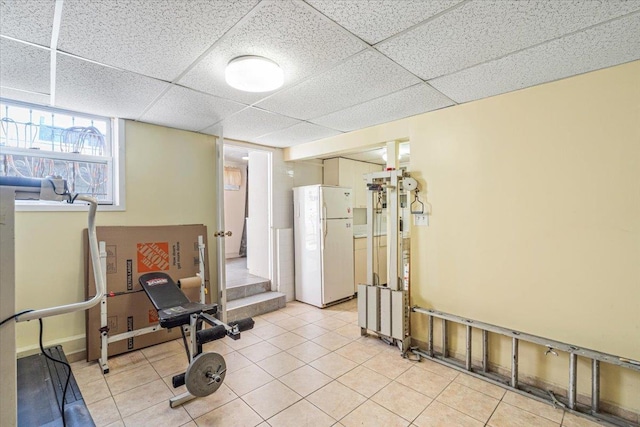 477 Berriman St, Brooklyn, NY 11208 - workout room featuring a drop ceiling and light tile patterned floors