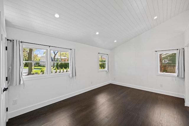 10 Shinnecock Ln, Hampton Bays, NY 11946 - spare room with lofted ceiling, dark wood finished floors, baseboards, recessed lighting, and wood ceiling