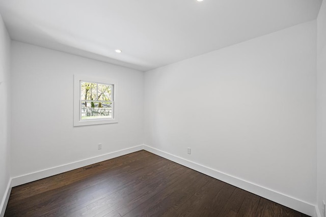 10 Shinnecock Ln, Hampton Bays, NY 11946 - empty room with baseboards, dark wood-type flooring, and recessed lighting
