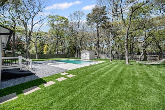 10 Shinnecock Ln, Hampton Bays, NY 11946 - view of yard featuring a shed, an outdoor structure, and a patio