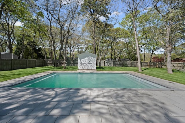 10 Shinnecock Ln, Hampton Bays, NY 11946 - view of swimming pool with a storage shed, an outbuilding, and a patio