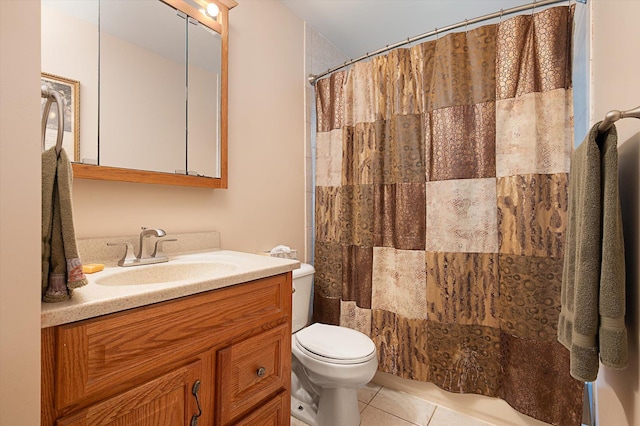 251 N Idaho Ave, Massapequa, NY 11758 - full bathroom with tile patterned floors, toilet, and vanity