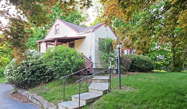 233 Peaceable Hill Rd, Brewster, NY 10509 - view of property exterior with a yard and stairway