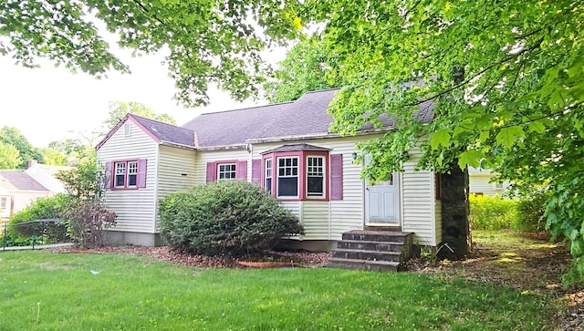 233 Peaceable Hill Rd, Brewster, NY 10509 - view of front of home featuring entry steps, a front lawn, and roof with shingles