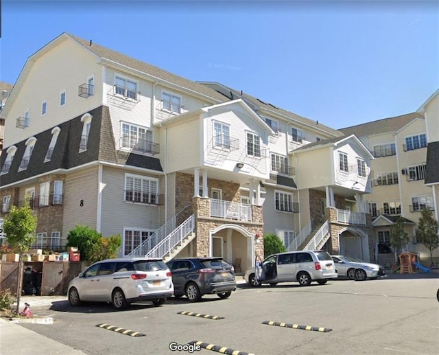 8 Lemberg Ct Unit 302, Monroe, NY 10950 - view of building exterior featuring stairway