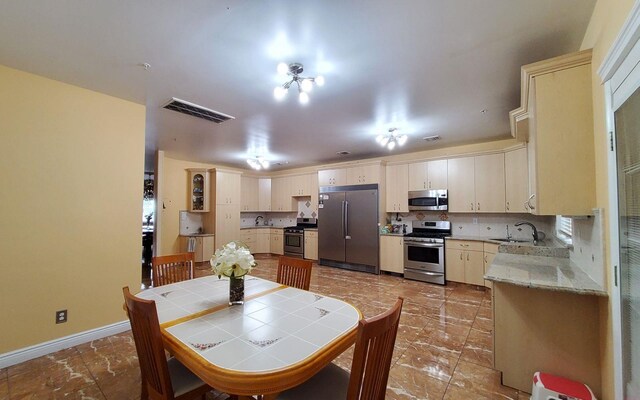 8 Lemberg Ct Unit 302, Monroe, NY 10950 - dining area featuring baseboards