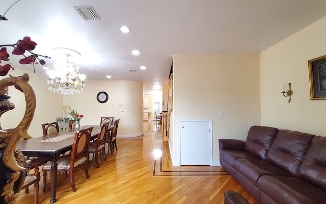 8 Lemberg Ct Unit 302, Monroe, NY 10950 - living area with light wood-type flooring, recessed lighting, a chandelier, and baseboards