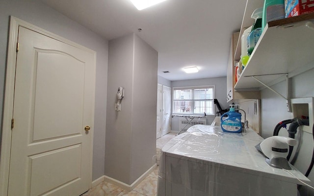8 Lemberg Ct Unit 302, Monroe, NY 10950 - clothes washing area with washer / dryer and baseboards