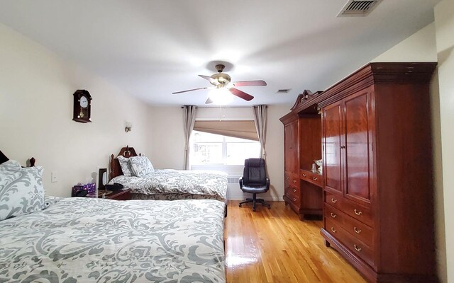 8 Lemberg Ct Unit 302, Monroe, NY 10950 - bedroom featuring light wood-style flooring, ceiling fan, and baseboards