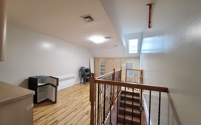 8 Lemberg Ct Unit 302, Monroe, NY 10950 - corridor with an upstairs landing and light wood-type flooring
