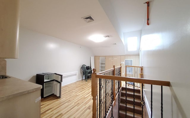 8 Lemberg Ct Unit 302, Monroe, NY 10950 - hall featuring an upstairs landing and light wood-type flooring