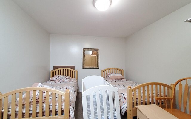 8 Lemberg Ct Unit 302, Monroe, NY 10950 - bedroom with baseboards