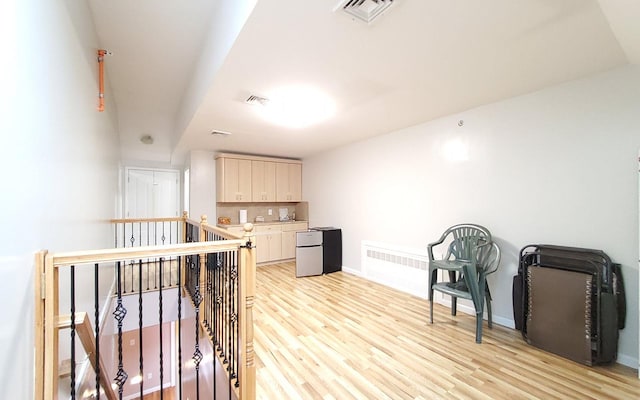8 Lemberg Ct Unit 302, Monroe, NY 10950 - hall featuring light wood finished floors, baseboards, and an upstairs landing