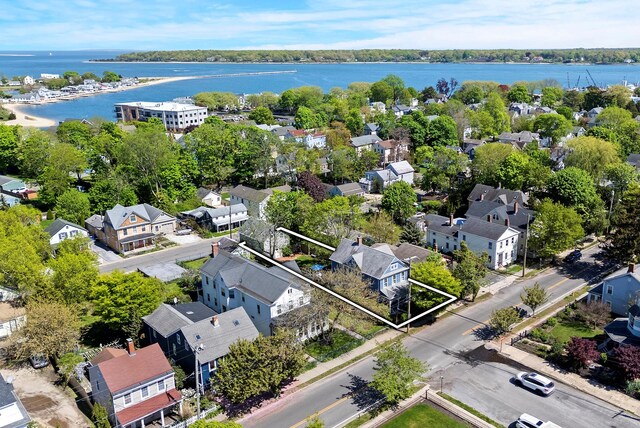 604 Main St, Greenport, NY 11944 - aerial perspective of suburban area featuring a large body of water and property boundaries highlighted