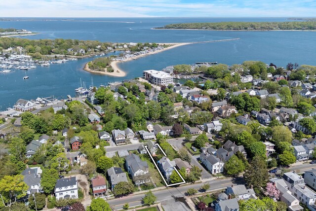 604 Main St, Greenport, NY 11944 - aerial view of property's location featuring a large body of water, nearby suburban area, and property boundaries highlighted