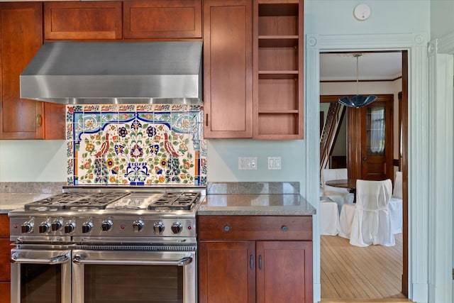 604 Main St, Greenport, NY 11944 - kitchen featuring range with two ovens, range hood, open shelves, brown cabinetry, and light stone countertops