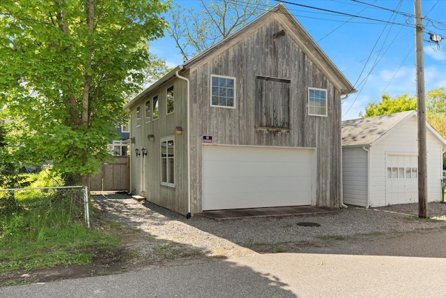 604 Main St, Greenport, NY 11944 - garage featuring a detached garage