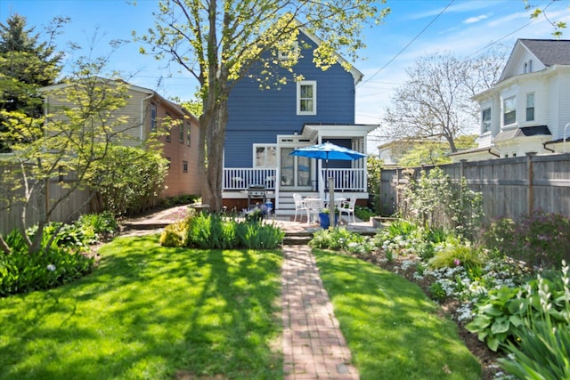604 Main St, Greenport, NY 11944 - back of property featuring a deck