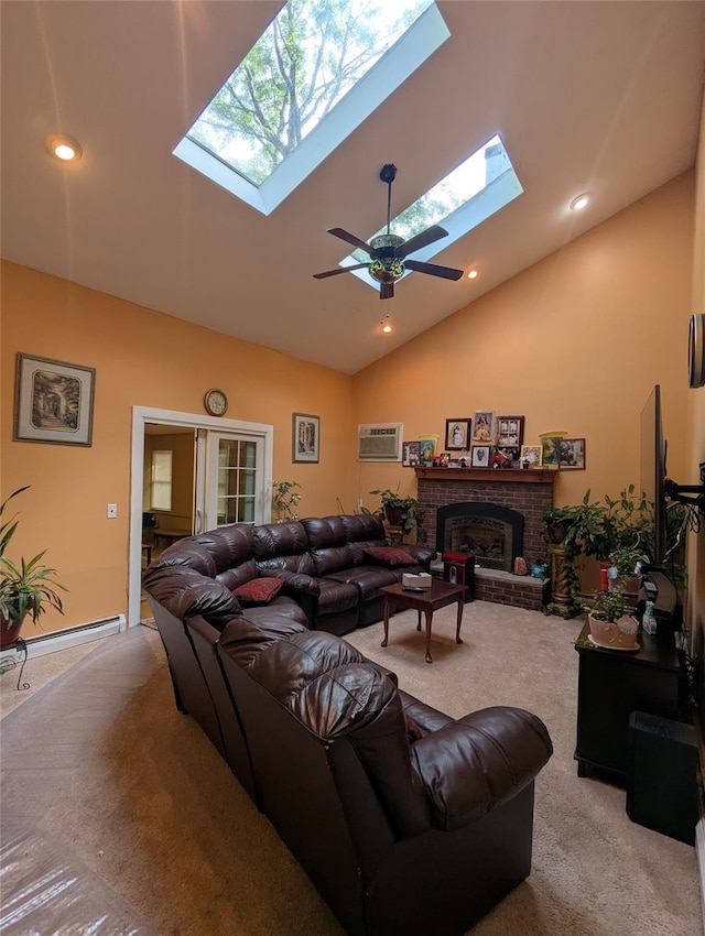 living area with a skylight, carpet flooring, a brick fireplace, a ceiling fan, and high vaulted ceiling