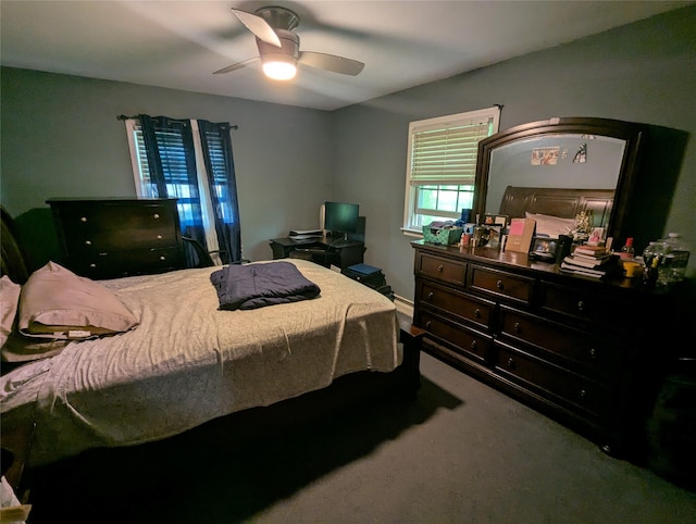 carpeted bedroom with a ceiling fan