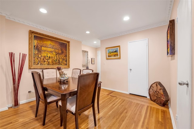100-25 Queens Blvd Unit 6E, Forest Hills, NY 11375 - dining area featuring baseboards, light wood-style flooring, crown molding, and recessed lighting