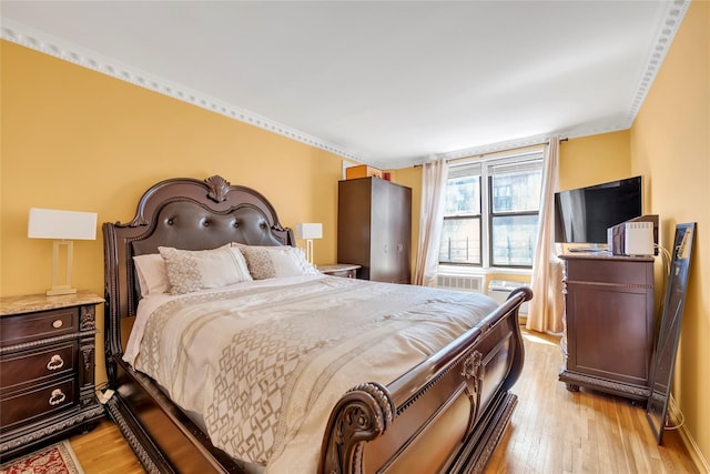 100-25 Queens Blvd Unit 6E, Forest Hills, NY 11375 - bedroom with light wood-style floors