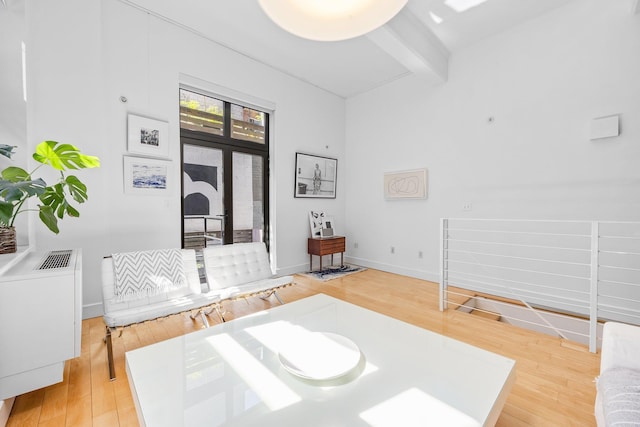 242 S 1st St Unit 1D, Brooklyn, NY 11211 - interior space with beamed ceiling, light wood-style floors, and baseboards